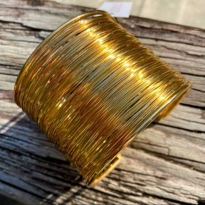 Izzy & Liv gold wire wide cuff bracelet NWT 2.25”